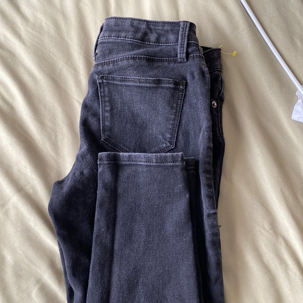 Stretched black jeans